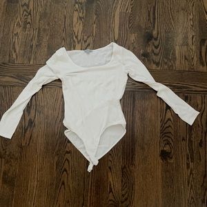 Cute rue 21 white long sleeve bodysuit !
